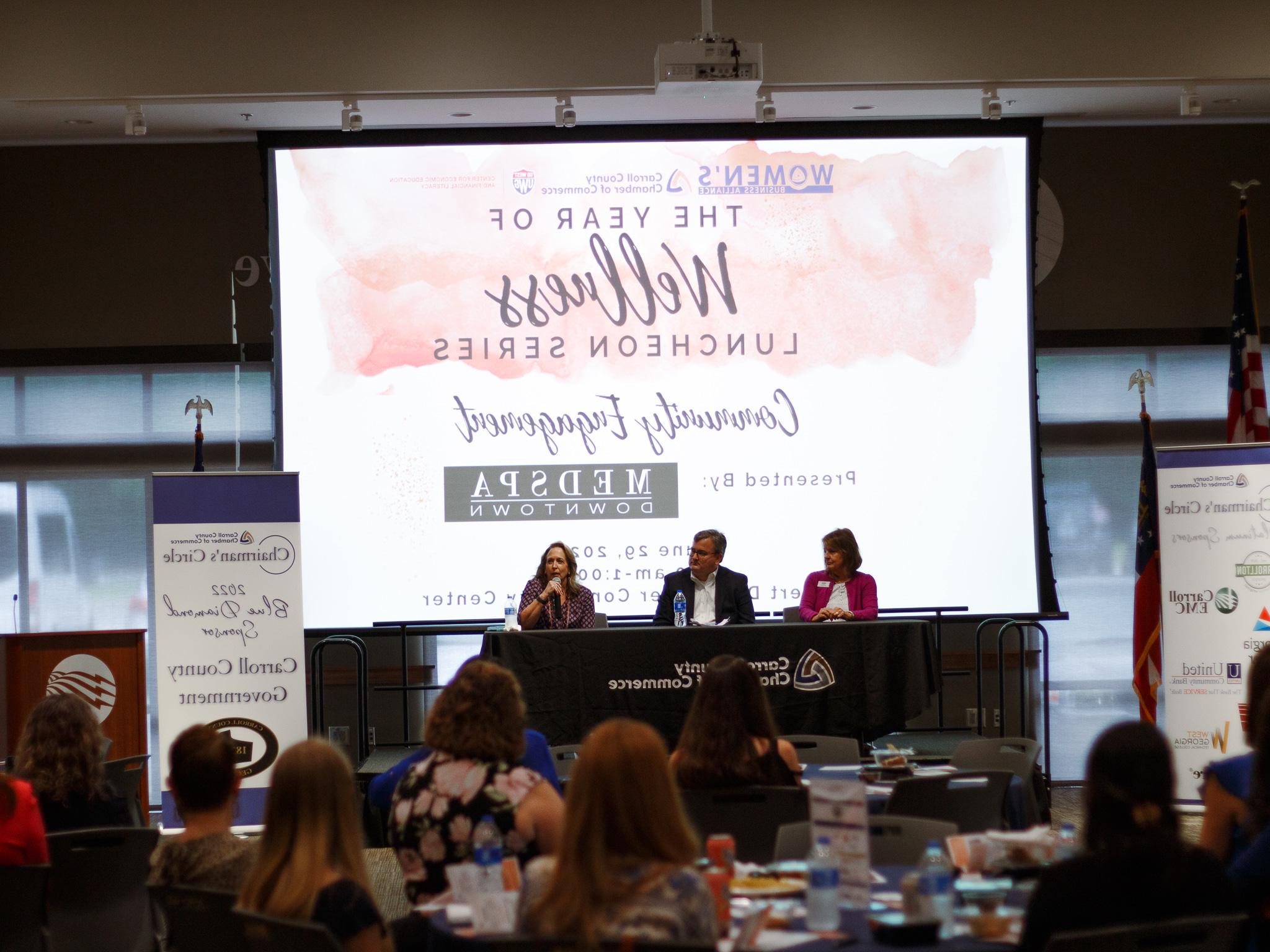 Presenters speaking at The Year of Wellness Luncheon Series.